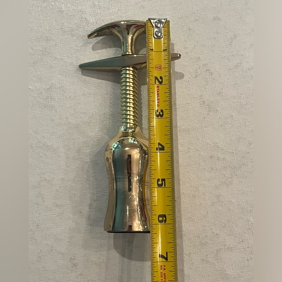 Shiny gold twisting corkscrew wine opener. Very cool! - Picture 5 of 5